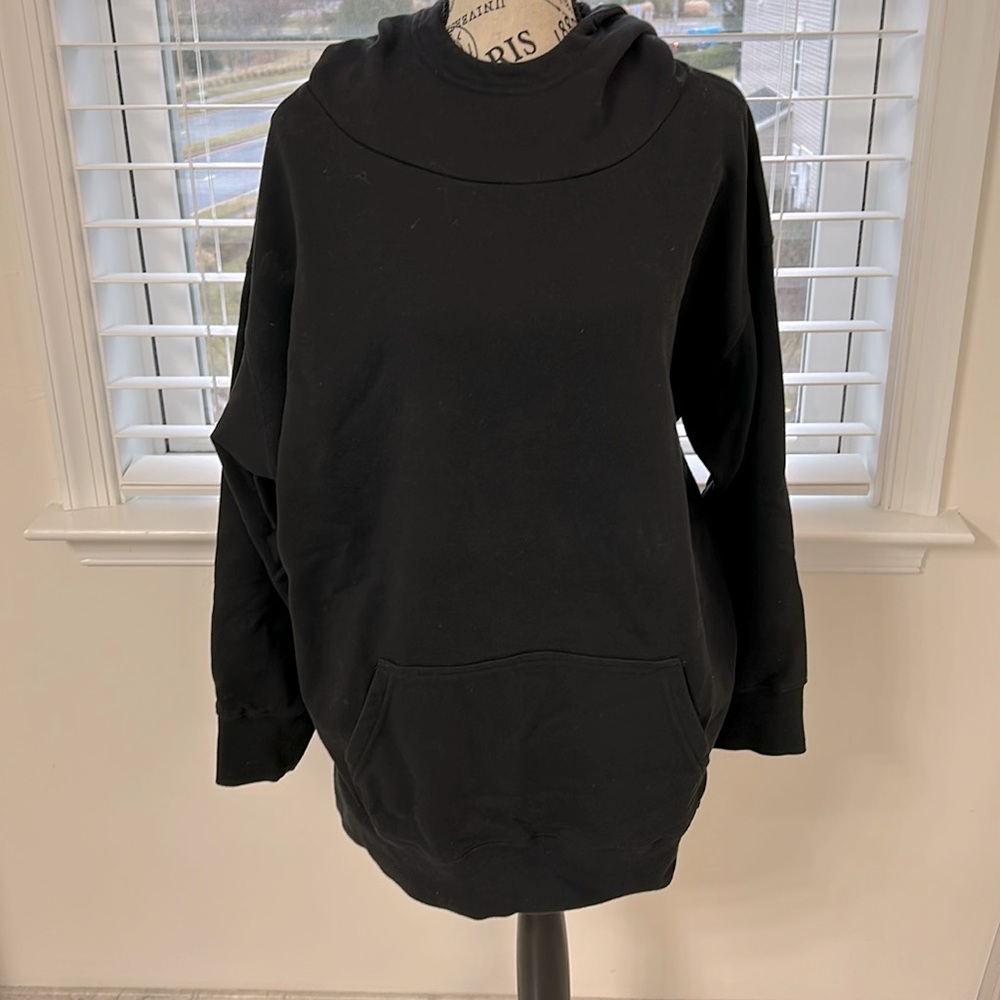 Oversized, black, hooded sweatshirt